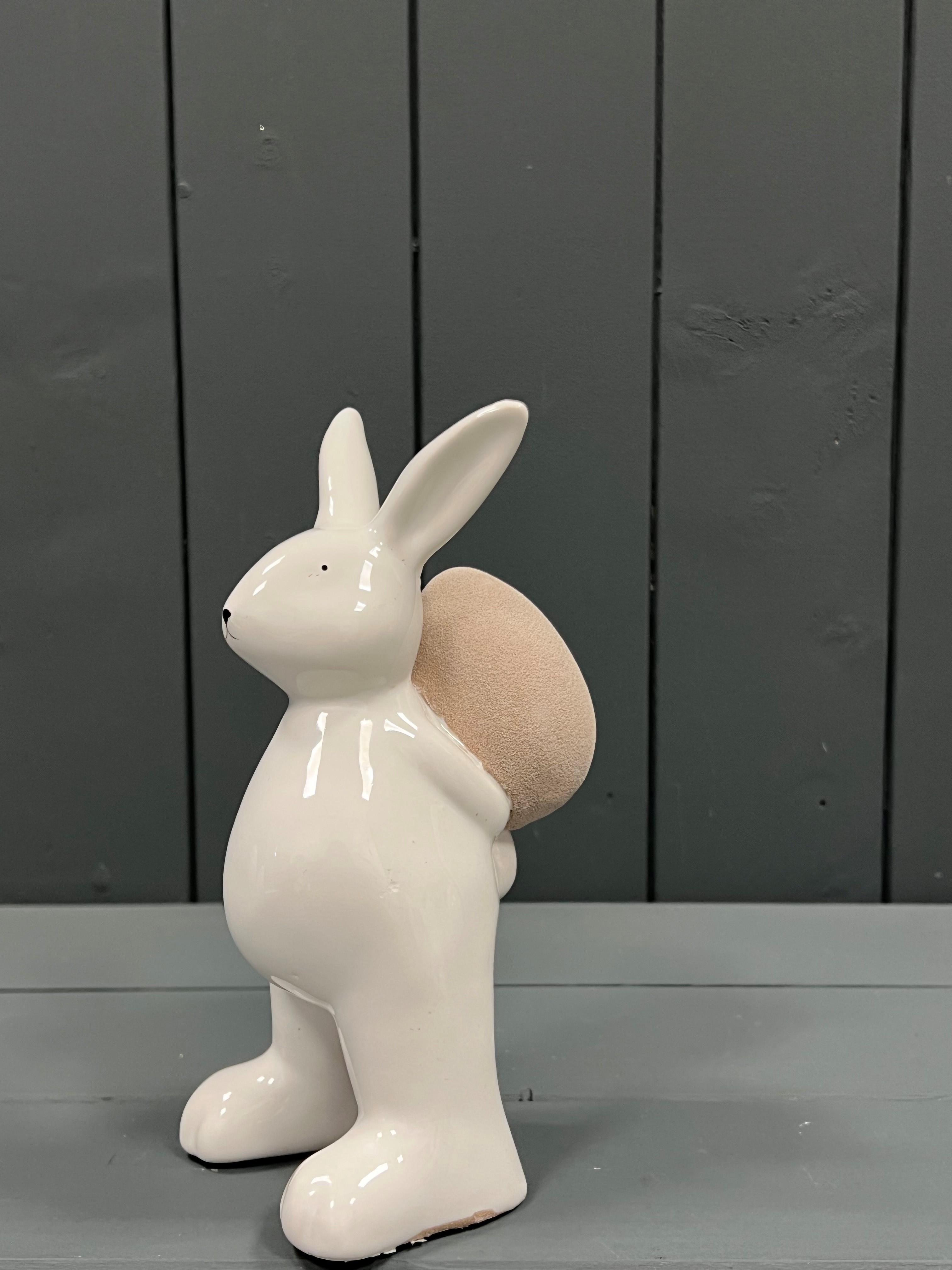 Small White Ceramic Rabbit with Easter Egg detail page